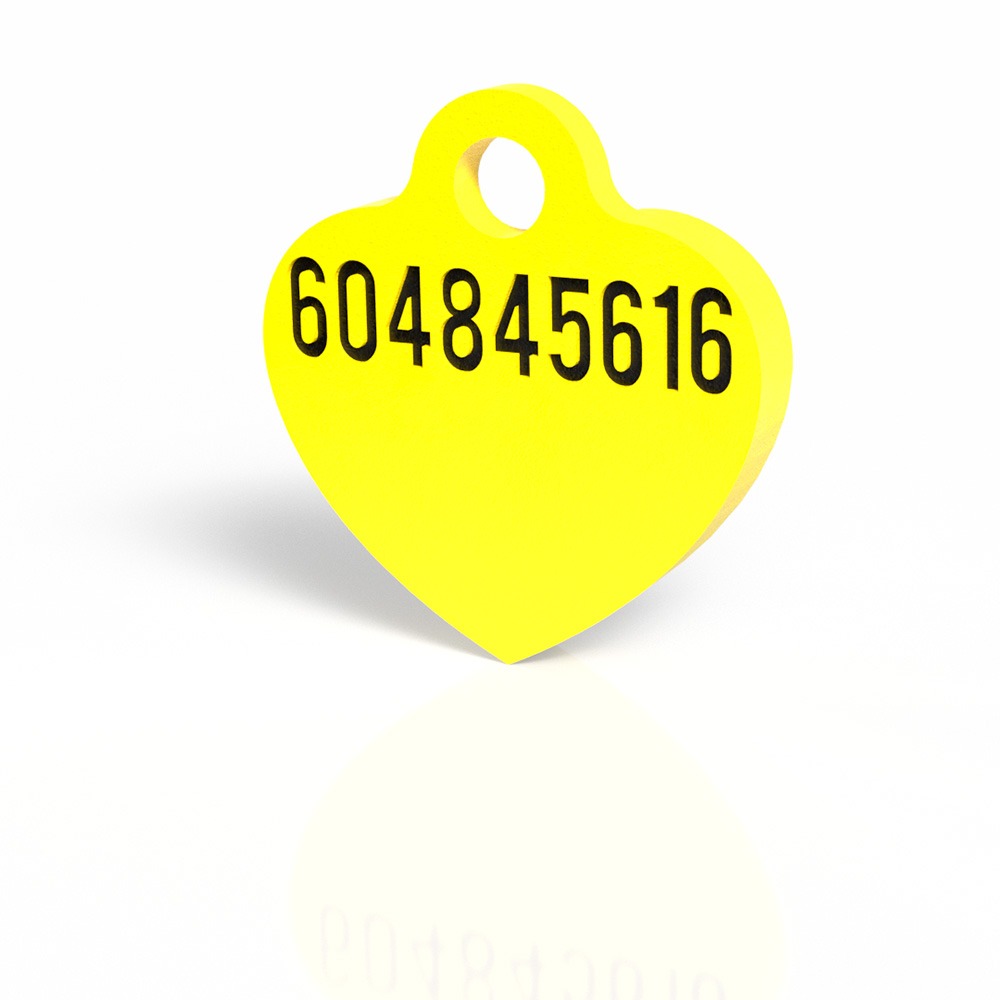 Chapita con forma de corazón amarillo 4 Mira Que Guau! Vista trasera de chapita identificativa en forma de corazón color amarillo.