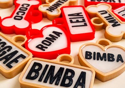 a group of plastic tags with text